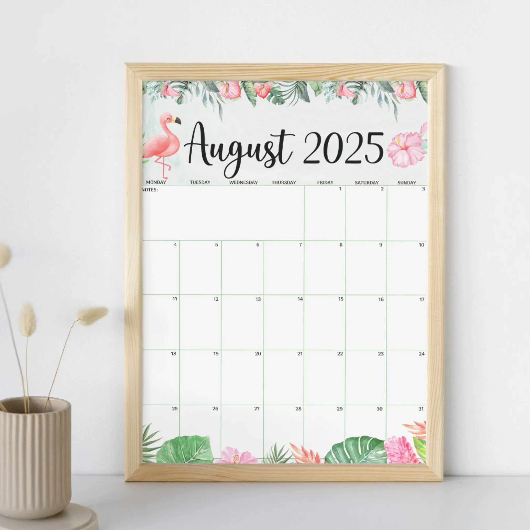 Framed August 2025 calendar on white wall – summer decor