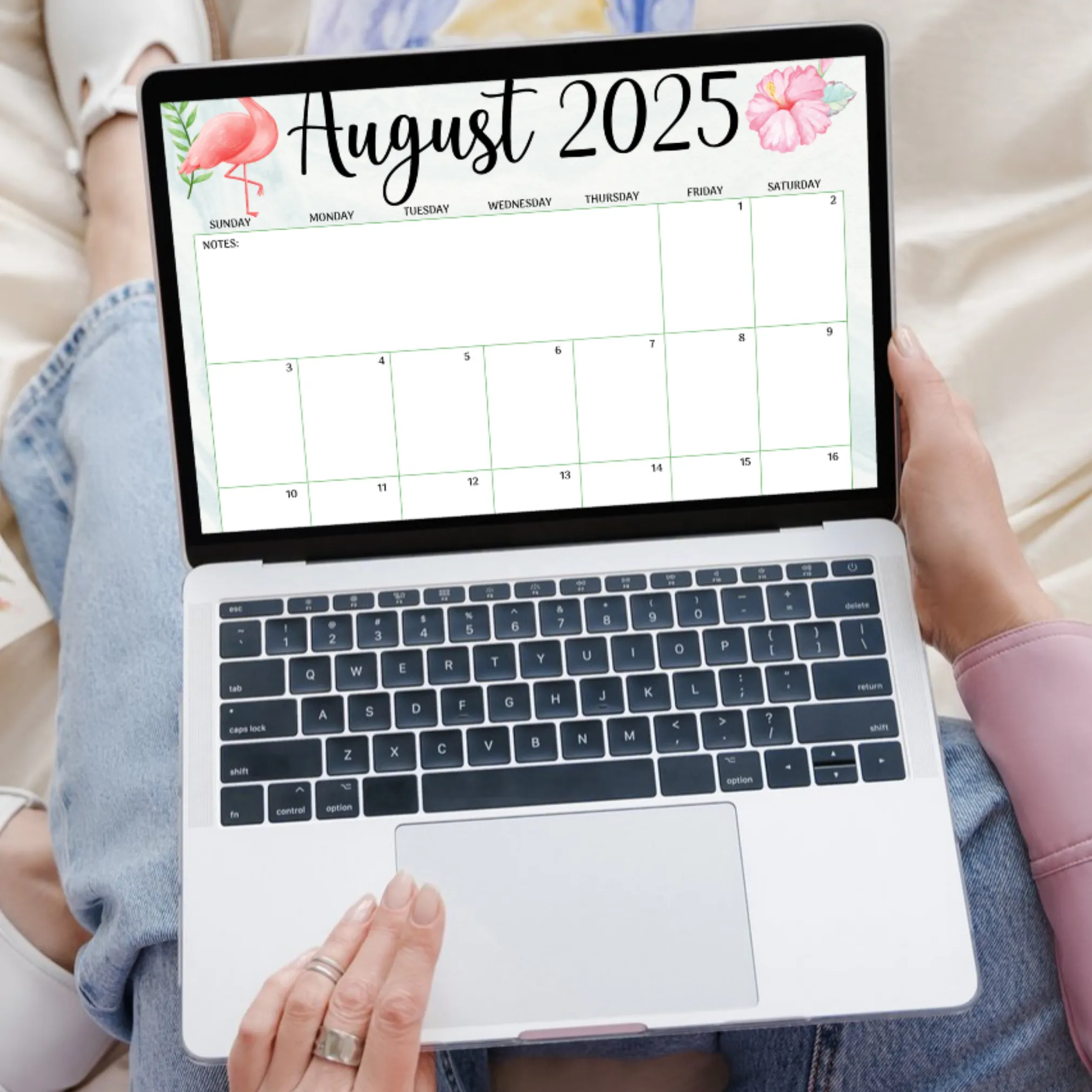 Tropical calendar August 2025 displayed on laptop screen