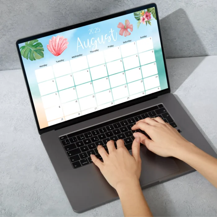 Person typing on laptop with fillable August 2025 calendar displayed